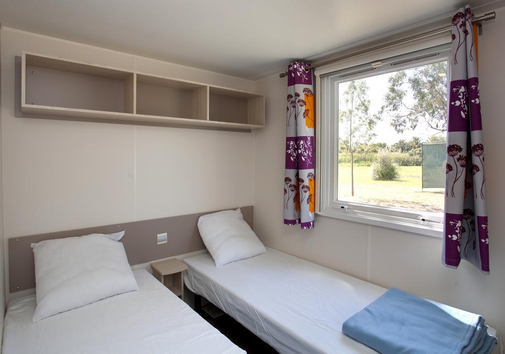 Hotel Camping Miami Plage Poggio Mezzana Pokoj fotografie